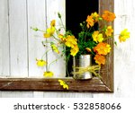 Recycled Tin With Yellow Cosmos....