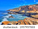Rocky Cliffs And Tidepools At...