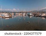 Small photo of Geneva, Switzerland - 25 March 2022: Scenic view from the Geneva Lake at the Bay of Geneva, the French section of Switzerland.