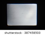 Small photo of The rectangle of light on a black background coming from the overhead projector