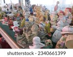 Small photo of selangor.malaysia.1.8.2023. assorted porcelain dolls, or so called bisque doll is a doll that is wholly or partially made out of bisque porcelain, a type of porcelain that is unglazed and matte.