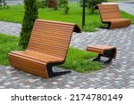 Modern Wooden Benches Standing...