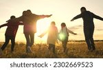 Small photo of child mother father running sunset. happy family sunny run., child run healthy lifestyle in park at sunset, family nature, family children run park outdoors, children dream, silhouette running people