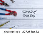 A couple of Tools on a wooden floor, Worship of Tools Day concept Selective focus 2023