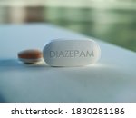 Small photo of Diazepam Tablet medicine of the benzodiazepine family that produce calming effect and Pill used to treat anxiety seizures muscle spasms trouble sleeping and restless legs syndrome