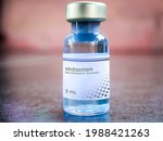 Small photo of Midazolam medical bottle of benzodiazepine medication used in anesthesia, procedural sedation, trouble sleeping and severe agitation