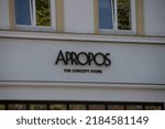 Small photo of Hamburg, Germany 23 June 2022, The brand logo of the national luxury retailer for design fashion "APROPOS The Concept Store" in front of a branch in Hamburg