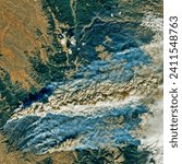 Small photo of East Troublesome Fire Spreads to the Rockies. The blaze grew 140,000 acres in 24 hours to become the second largest fire in Colorado history. Elements of this image furnished by NASA.