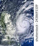 Small photo of Typhoon Nari 24W approaching the Philippines. Typhoon Nari 24W approaching the Philippines. Elements of this image furnished by NASA.