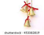 Three Gold Christmas Bells Are...