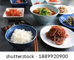 Normal Korean dining table with boiled rice and various side dishes, South Korea