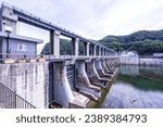 Small photo of Chuncheon-si, Gangwon-do, South Korea - May 24, 2023: Summer view of bridge and floodgate of Uiam Dam on Bukhan River