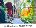 Small photo of Byron Bay, Australia - May 25, 2021: Colorful tented hostel in Byron Bay, Australia