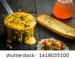 Small photo of Delicious and colorful street food with eggs and vegetables garnish on a black table
