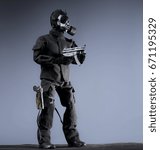 Small photo of Full length gas mask machine gunner
