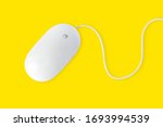 Simple white computer mouse with cord isolated on yellow background, minimal style