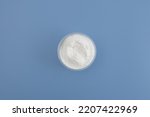 Small photo of Sodium Carboxymethyl Cellulose Powder, NaCMC. Food additive E466 in bowl, top view. Stabiliser and Thickener. Agar and Gelatin replacer. Glazing agent.