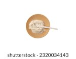 Small photo of Xanthan Gum Powder and measuring spoon on wooden plate, top view. Food additive E415. Texture improver. Stabiliser and Thickener. Used in cosmetic, and food industry as binding agent.