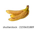 Bunch of yellow ripe bananas with dark brown spots isolated on a white background.