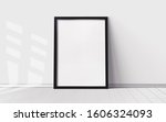 White poster with blank frame...
