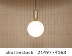 Beautiful modern ceiling lamps light bulbs ball shape decoration for home and living on the wall background with copy space for text. Concept building interior contemporary.