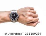 Watch on wrist isolated over a white background