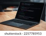 Small photo of Laptop screen display blur script code, compiler, encode, debug, developer application software for business corporate with laptop computer. Instruction set of programming coding app from work at home
