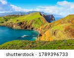 Ponta de Sao Lourenco, Madeira,Portugal. Beautiful scenic mountain view of green landscape,cliffs and Atlantic Ocean. Hiking active day fresh summer scene. Travel holiday background