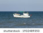 Small White Fishing Boat...
