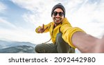 Young Hiker Man Taking Selfie...