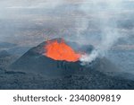 Small photo of Close up view of spatter cone with lava of fissure near Litli-Hrutur Hill during the 2023 eruption near the mountain Fagradalsfjall, Iceland volcano area