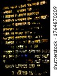 an office building at night ... | Shutterstock . vector #1764870209