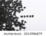 White background with small black letters. White background with many letters with the word words written. The word words written with small letters in black and white background.
