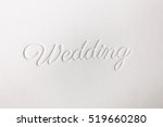 Small photo of Logo wedding book and the word "Wedding" supplanted on the leather cover