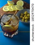 Small photo of typical Spanish aperitif, with verbose, olives and chips with pepper and lemon