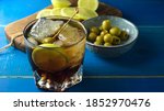 Small photo of typical Spanish aperitif, with verbose, olives and chips with pepper and lemon
