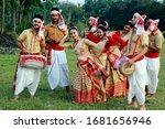 Small photo of Assam /India- March 24 2020 : Assamese young boys and girls performing Bihu dance on the occasion of Rongali Bihu celebrated in the month of April.