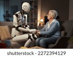 An elderly woman confides her psychological distress to her robotic assistant. Concept of psychological support thanks to A.I.