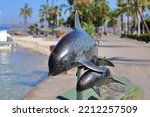 Small photo of La Paz, Baja California Sur, Mexico. October 30, 2022. Sculpture of two Pacific porpoise (Phocoena sinus). Artwork located on the city's seaside.