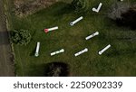 Small photo of minigolf course in park catch golf balls behind obstacle. game for points below par or above par, retirement house, senior, pay, game, tourist, beach, sand, resort, hotel, apartment, circle, meadow