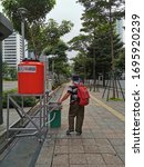 Small photo of Jakarta, Indonesia, March 24, 2020 : Bina Marga provides hand washing on public area to make it easier for residents to wash their hands to avoid Covid-19