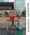 Small photo of Jakarta, Indonesia, March 26, 2020 : Bina Marga provides hand washing places on public roads to make it easier for residents to wash their hands