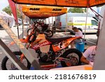 Small photo of San Blas, Teruel, Aragon, Spain, July 22, 2022, prologue stage of the rally-type stage race in semi-desert lands, with high temperatures, international calendar test, a stand with competition motor