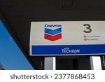 Small photo of Emblem of the Chevron oil company at Chevron gas station. Lynden, WA, USA - 13 November 2022