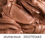 Chocolate flavour gelato - full frame detail. Close up of a brown surface texture of chocolate Ice cream.