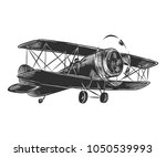 Vector engraved style illustration for posters, decoration and print. Hand drawn sketch of airplane in monochrome isolated on white background. Detailed vintage woodcut style drawing.