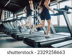 Small photo of Hispanic and American Couple run treadmill Fitness in the Gym. Caucasian Man and Hispanic Woman Engaged in Intense Workout. Young Fit Couple Training Together at the Gym