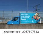Small photo of Amsterdam, the Netherlands - September 2021: delivery van dutch supermarket Albert Heijn en route