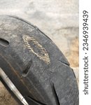 Small photo of threadbare and leaky tires. threadbare and leaky tires. Tires that are worn out and have been used for a long time