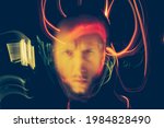 Small photo of White adult caucasian man with face illuminated by light painting technique. Concept of dreaming, other dimension, introspection, madness, loneliness, mental disease.